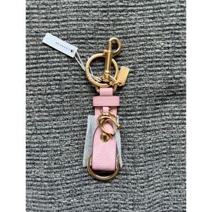 COACH Powder Pink Trigger Snap Bag Charm In Signature Canvas